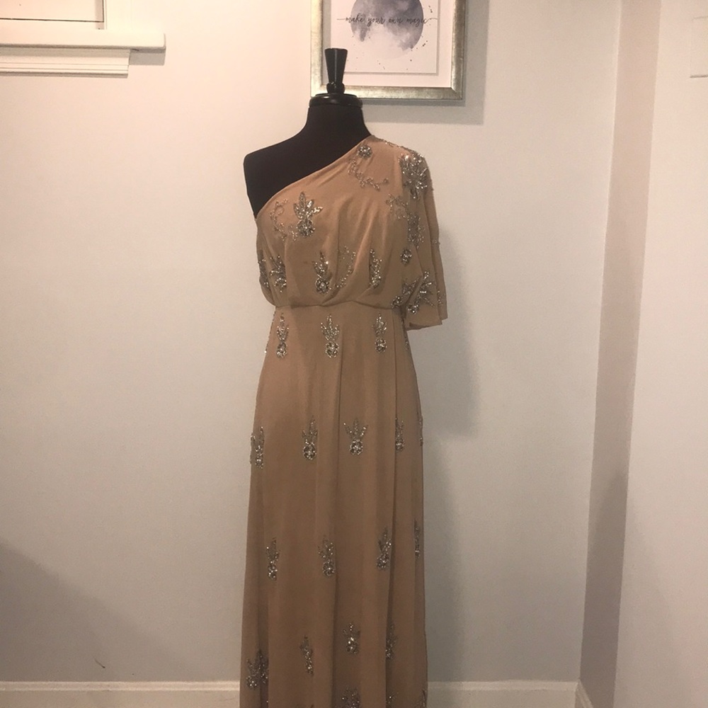 A-symmetrical beaded gown